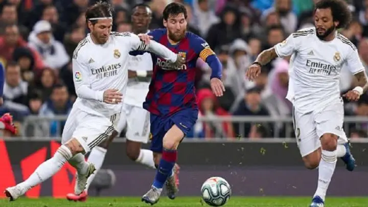 Jugadores del Barcelona y Real Madrid 
