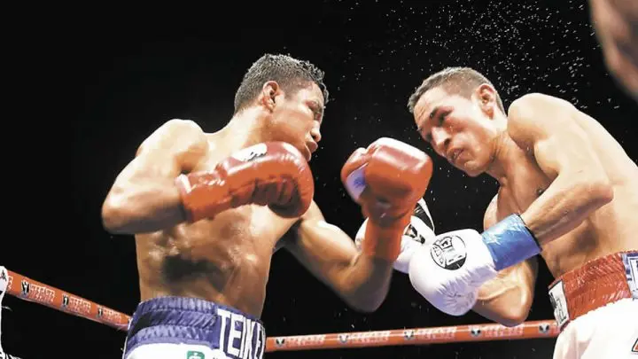 Román "Chocolatito y Gallo Estrada en Combate.