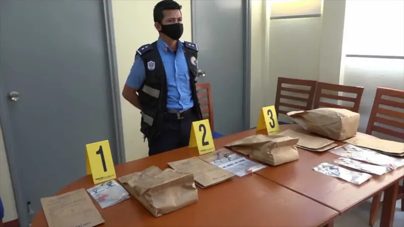 Policía Nacional presenta pruebas del homicidio. Policía Nacional presenta pruebas del homicidio.