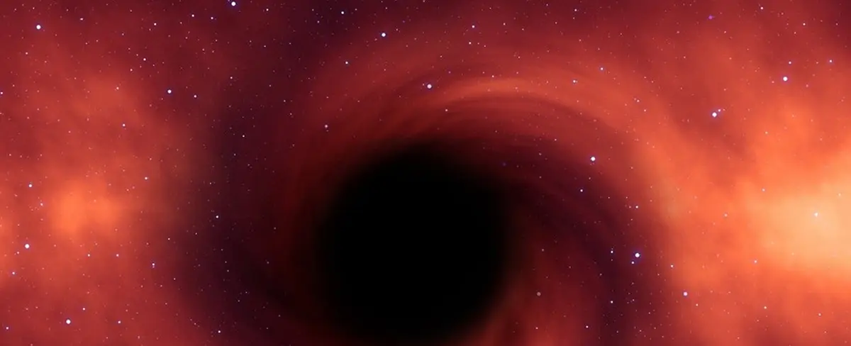 Astrónomos predicen fusión de dos agujeros negros en uno supermasivo