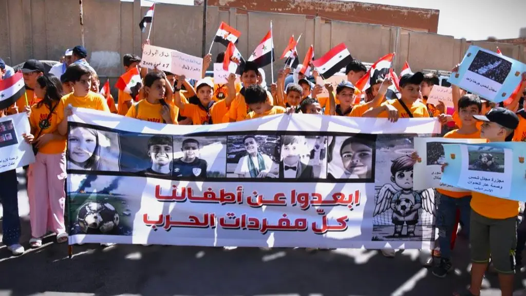 Protestas en Siria claman por la paz para los niños palestinos